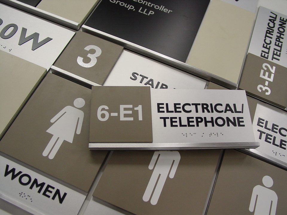 ADA braille and tactile signage system by Brown Graphics