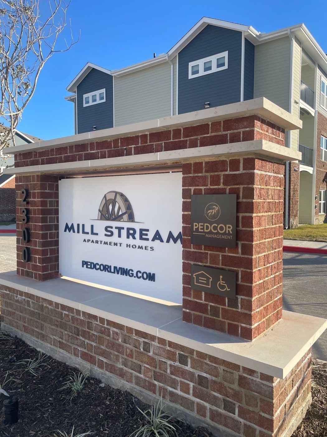 Brick monument sign for Mill Stream Apartment Homes